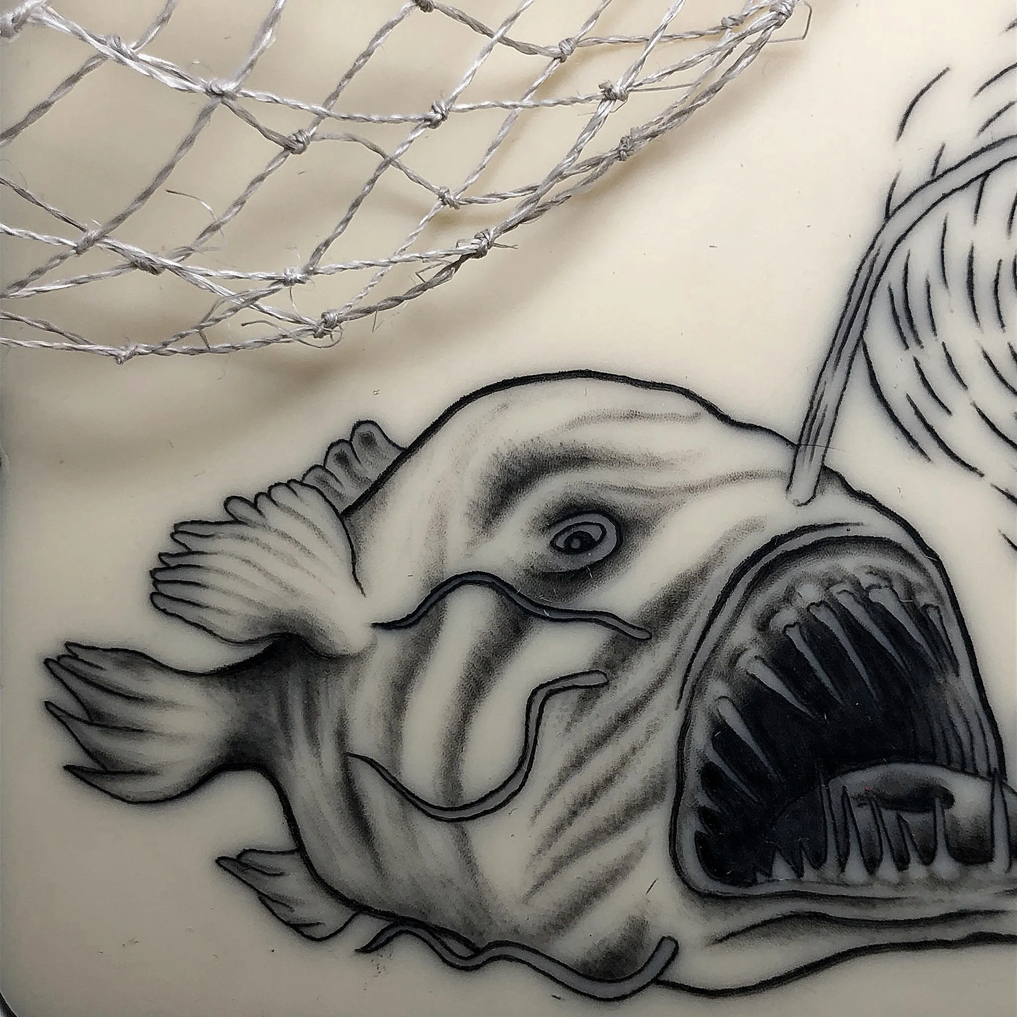 Tatuaggio blackwork di un pesce abissale